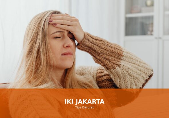 Ilustrasi seseorang yang sedang mengatasi sakit kepala
